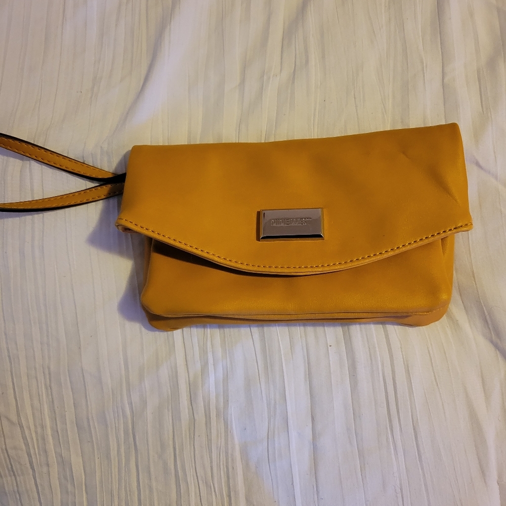 Nine west wristlet  mustard color